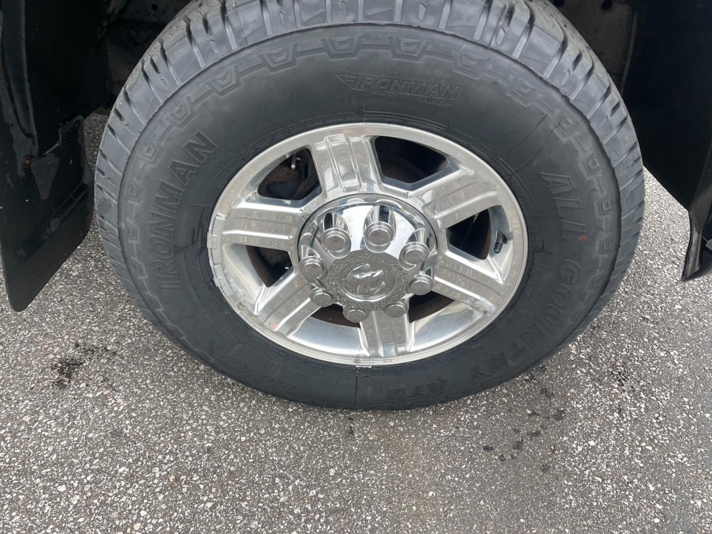 2012 Black /Black Dodge Ram 2500 Laramie Crew Cab SWB 4WD (3C6TD5FT6CG) with an 5.7L V8 OHV 16V engine, 6-Speed Automatic transmission, located at 547 E. Main St., Orwell, OH, 44076, (440) 437-5893, 41.535435, -80.847855 - This 2012 Dodge Ram 2500 Laramie Crew Cab is a heavy-duty pickup truck designed for serious towing and hauling capabilities. Powered by a 5.7L HEMI V8 engine mated to a 6-speed automatic transmission and 3.73 gearing, it boasts an impressive 10,550-pound towing capacity. The interior is well-appoint - Photo#17